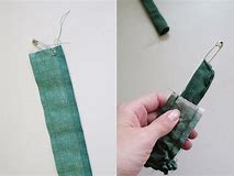 Turning a strap right side out using a safety pin