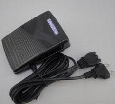 Sewing machine power chord and presser foot